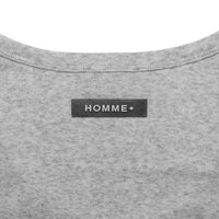 Gray garment with a 'HOMME+' label on a white background