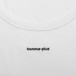 Close-up of a white shirt with 'homme-plus' branding.